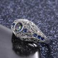 Opalescent Oval Blue Stone Filigree Ring In Two Metal Tones view 2