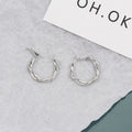 Gold and Silver Twisted Round Medium Size Hoop Earrings view 3