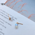 Gold Tone Iridescent Tiny Light Bulb Stud Earrings For Women view 6
