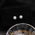 White Pearl Look Classic Round Eight Millimeter Stud Earrings view 4