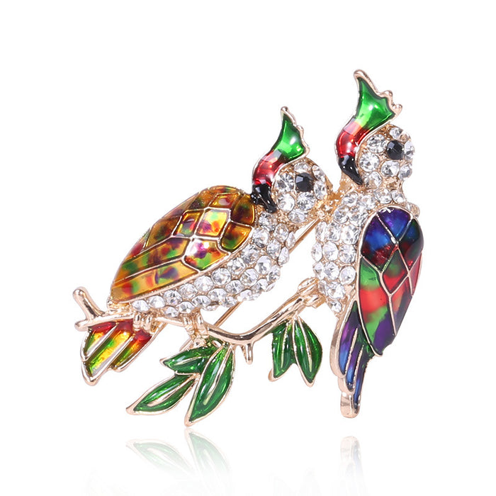 Jeweled Pair of Parrots Brooch in Three Enamel Colorways