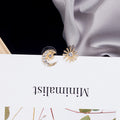 Mismatched Clear Look Crescent Moon and Sun Stud Earrings view 3