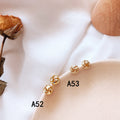 Gold Tone Polished Love Knot Twist Stud Earrings Pair view 2