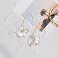 Long Gold U Wire and White Pearl Look Petal Earrings view 1