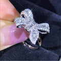 Baguette Clear Stone Bow Statement Ring In Polished Silver Tone view 1