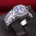 Silver-Tone Round Crystal Ring With Baguette Side Stones view 2