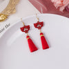 Double Fish Tassels