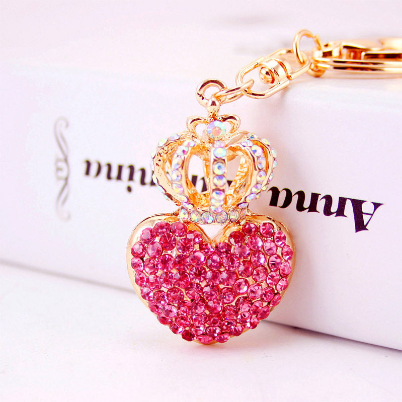 Rhinestone Perfume Bottle Keychain with Four Leaf Clover Metal Bag Charm