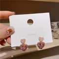 Geometric Crystal Stud Earrings with Sparkling Stone Details view 3