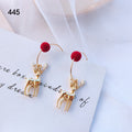 Gold Tone Reindeer Charm Earrings With Red Pom Posts view 3