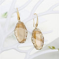Gold Tone Irregular Polygon Faceted Glass Drop Earrings in Three Colors view 8