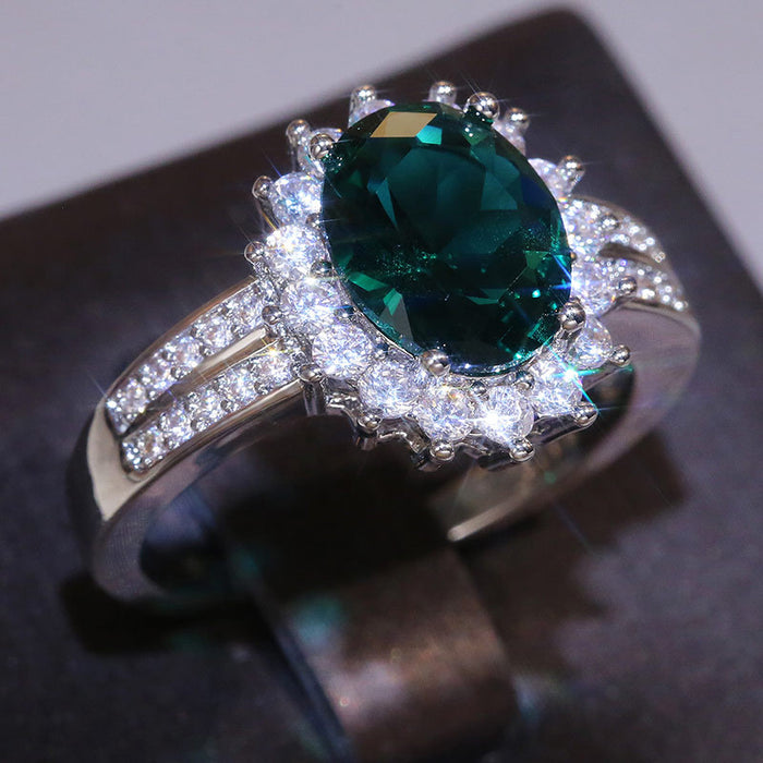 Green Oval Solitaire Halo Split Pave Ring In Silver Tone