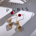 Gold Tone Reindeer Charm Earrings With Red Pom Posts view 2