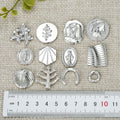Silver Tone Abstract Botanical and Figural Stud Earrings in Twelve Designs view 4