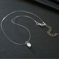 Clear Oval Crystal Pendant on an Invisible Cord Necklace view 4