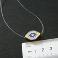 Gold Tone Crystal Framed Blue Evil Eye Invisible Cord Necklace view 4