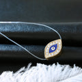Gold Tone Crystal Framed Blue Evil Eye Invisible Cord Necklace view 3
