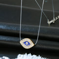 Gold Tone Crystal Framed Blue Evil Eye Invisible Cord Necklace view 2
