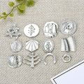 Silver Tone Abstract Botanical and Figural Stud Earrings in Twelve Designs view 1