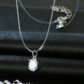 Clear Oval Crystal Pendant on an Invisible Cord Necklace view 2