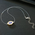 Gold Tone Crystal Framed Blue Evil Eye Invisible Cord Necklace view 5