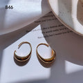 Gold Tone Polished Geometric C Shape Thick Hoop Earrings view 2
