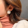 Pearl Crystal Halo Stud Earrings with Lustrous Bead Details view 2