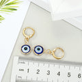 Gold Tone Small Round Evil Eye Huggie Drop Earrings in Three Designs view 3