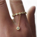 Gold Tone Chain Ring With Dangling Round Clear Stone view 1