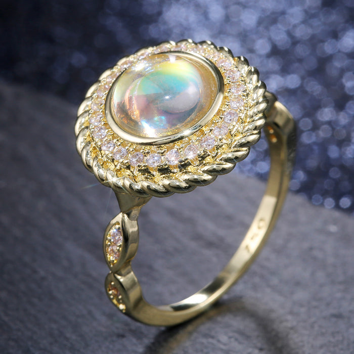 Gold Tone Round Iridescent Stone Ring with Clear Halo