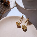 Gold Geometric Dangle Earrings Amber Stone Knot Variants view 6
