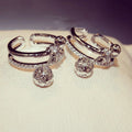 Silver Tone Open Ring with Two Clear Dangle Stones view 1