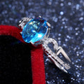 Silver Tone Open Ring with Blue Round Stone and Leaf Accent view 4