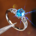 Silver Tone Open Ring with Blue Round Stone and Leaf Accent view 2