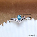 Silver Tone V Curve Ring with Light Blue Pear Stone view 5