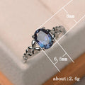 Silver Tone Blue Oval Stone Leaf Motif Ring Sizes 6-10 view 5