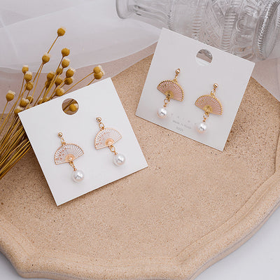 Primary supplied view of fan pearl-look stud and clip earrings