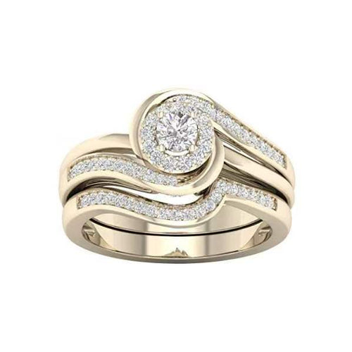 金色旋涡双层套戒 alternate angle showing layered gold-tone wave bands curling around a clear round cluster
