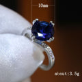 Silver Tone Ring with Deep Blue Round Center Stone view 5