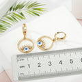 Open Circle Lash Evil Eye Huggie Drop Earrings in Two Finishes view 3