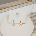 Ten White Daisy Stud Hook and Clip Earring Options view 3