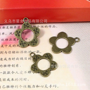 Dotted Openwork Five Petal Flower Charms in Three Finishes
