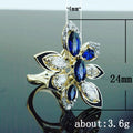 Blue Marquise Stone Flower Ring In Gold Tone Setting view 5