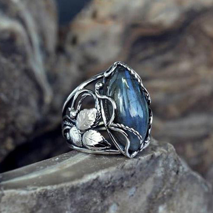 Antique Silver Tone Floral Ring with Blue Marquise Stone