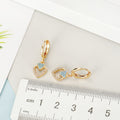 Double Heart Crystal Huggie Drop Earrings in Gold or Silver Tone view 3