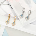 Double Heart Crystal Huggie Drop Earrings in Gold or Silver Tone view 2