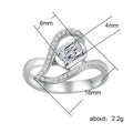 Silver Open Heart Knot Ring In A Polished Decorative Design view 2