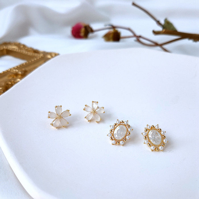 Gold White Flower And Oval Pearl Halo Stud Earrings