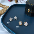 Gold White Flower And Oval Pearl Halo Stud Earrings view 2