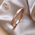 Four Gold Tone Bangle Styles With Shell Inlay And Crystal Details view 4